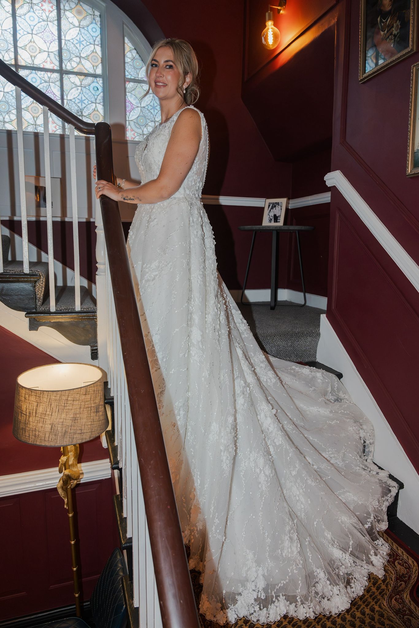 Bride in wedding dress on stairs